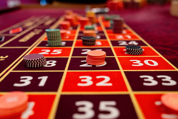AduQ card game interface on charade showing card layout and betting area